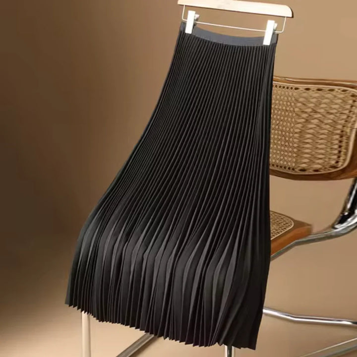 Elegante dames plooirok midi lengte, veelzijdig en modieus, perfect voor zowel casual als chique kleding.