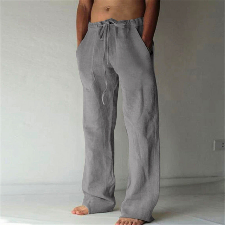 Moderne heren comfortbroek met hoge taille en trekkoord. Wijde pijpen voor een casual, comfortabele look.