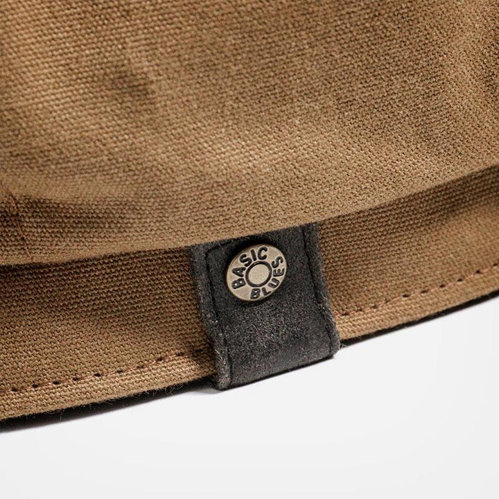 Vintage bruine heren pet, klassieke flatcap baret voor een authentieke retro look.