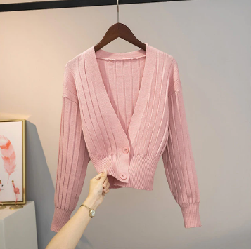 Vooraanzicht: stijlvolle dames cropped sweater met ronde hals in effen kleur.