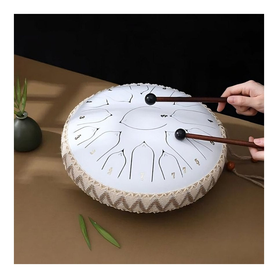 Ontspannende tongtrommel als cadeau. Unisex muziekinstrument met muziekboek. Stimuleert creativiteit.