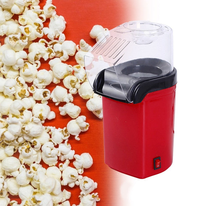 Eenvoudig te reinigen rode popcornmachine; een must-have snackmaker voor elke keuken.