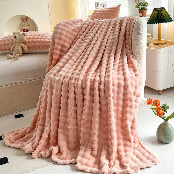 Stijlvolle sprei met bubbeltextuur, voelt pluche en zacht aan. Een comfortabele toevoeging aan elk interieur.