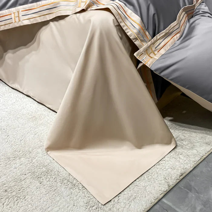 Comfortabel ademend satijn katoen beddengoed met geborduurd design. Voor een luxe slaapervaring.
