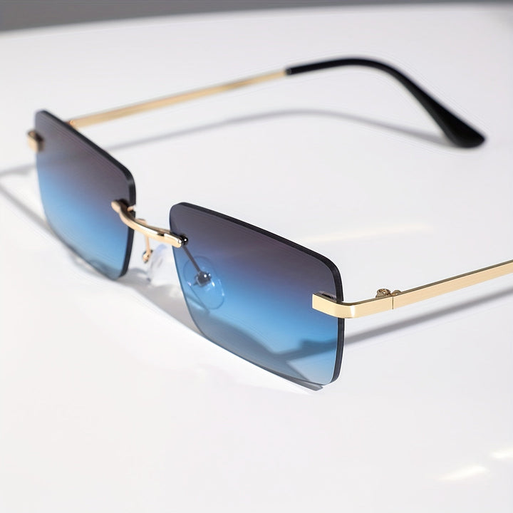 Trendy frameloze zonnebril voor mannen met minimalistisch metalen montuur. Stijlvol en modern accessoire.