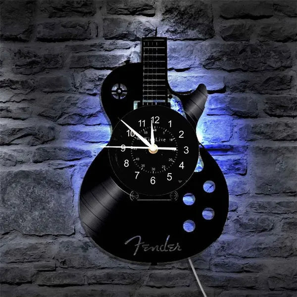 Stijlvolle zwarte gitaar wandklok, perfect voor muziekliefhebbers. Modern design klok voor interieur decoratie.