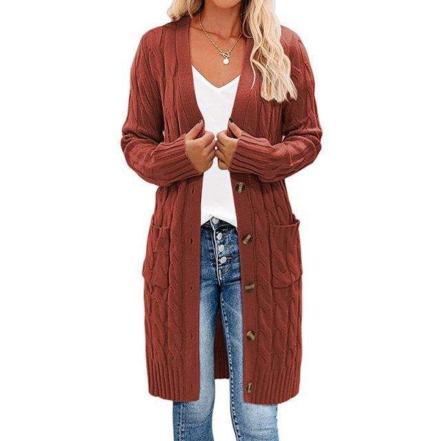 Veelzijdig lang gebreid damesvest, gedraaid patroon. Essentieel voor zowel casual als stijlvolle herfst/winter outfits.