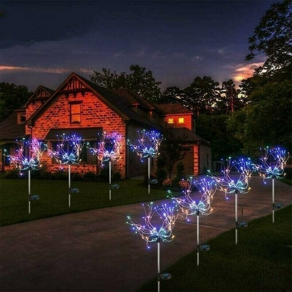 Waterdichte solar LED buitenverlichting in vuurwerk design, ideaal voor elke tuin en terras.