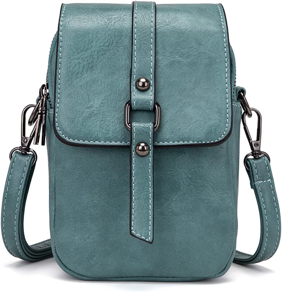 Klassieke dames crossbody tas met PU leer afwerking. Essentiële handtas voor een chique uitstraling onderweg.