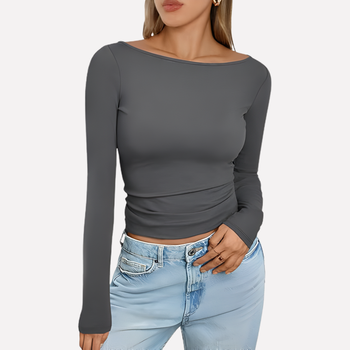 Veelzijdige vrouwen top met boothals en lange mouwen; comfortabel en elegant voor diverse gelegenheden.
