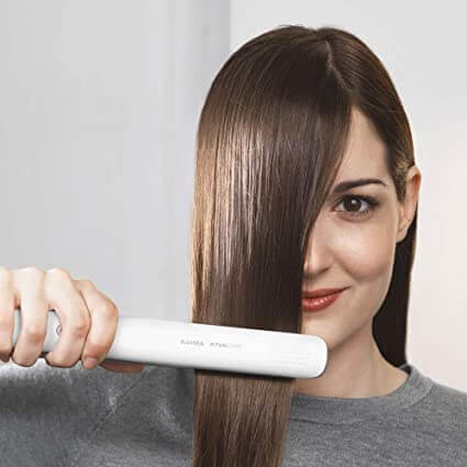 Reisvriendelijke HairToolz™ 2-in-1 styler voor dames. Compacte krultang en stijltang voor onderweg.