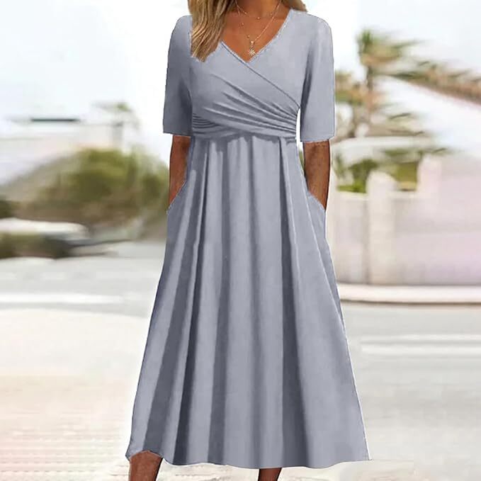 Elegante casual vintage damesjurk met V-hals en korte mouwen. Ideaal voor de zomer.