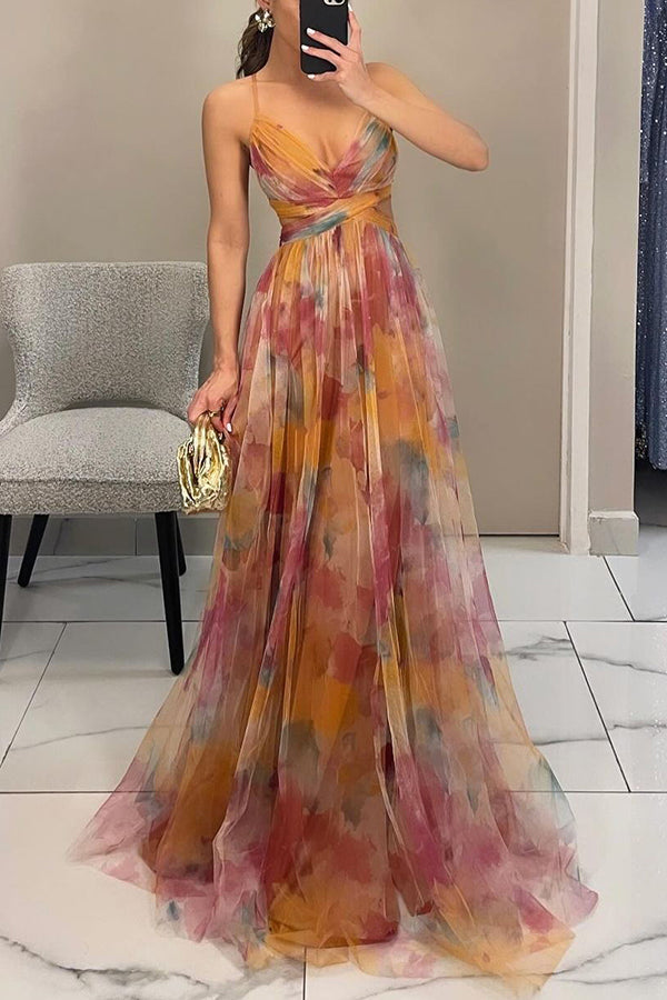 Lange multicolor damesjurk, mouwloos met V-hals, perfect als elegante avond- of feestjurk.