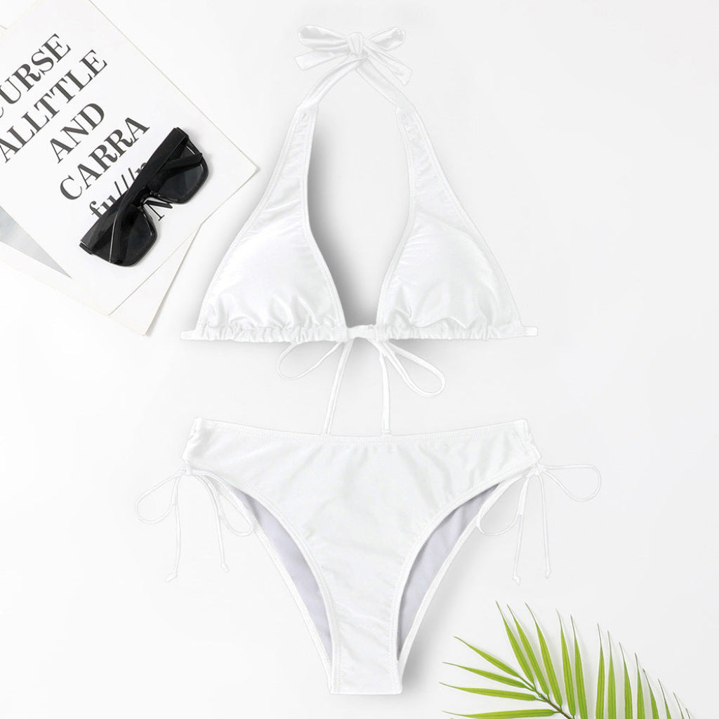 Stijlvolle effen dames bikini met bandjes, verkrijgbaar in diverse kleuren zoals blauw, wit, legergroen.