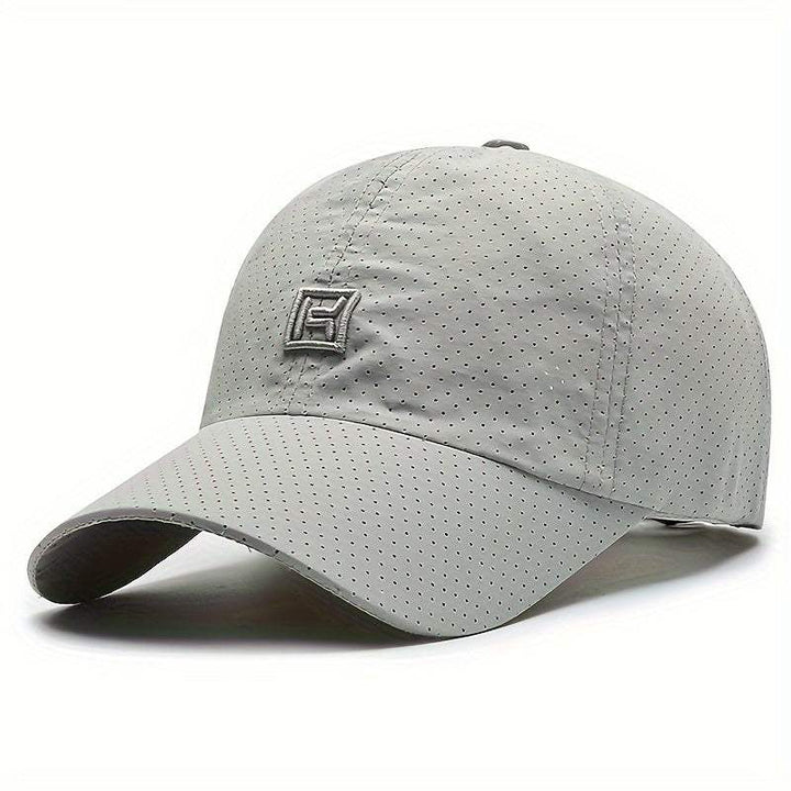 Grijze unisex sportpet, ontworpen voor optimale ventilatie tijdens het sporten. Duurzame hoofdbedekking.