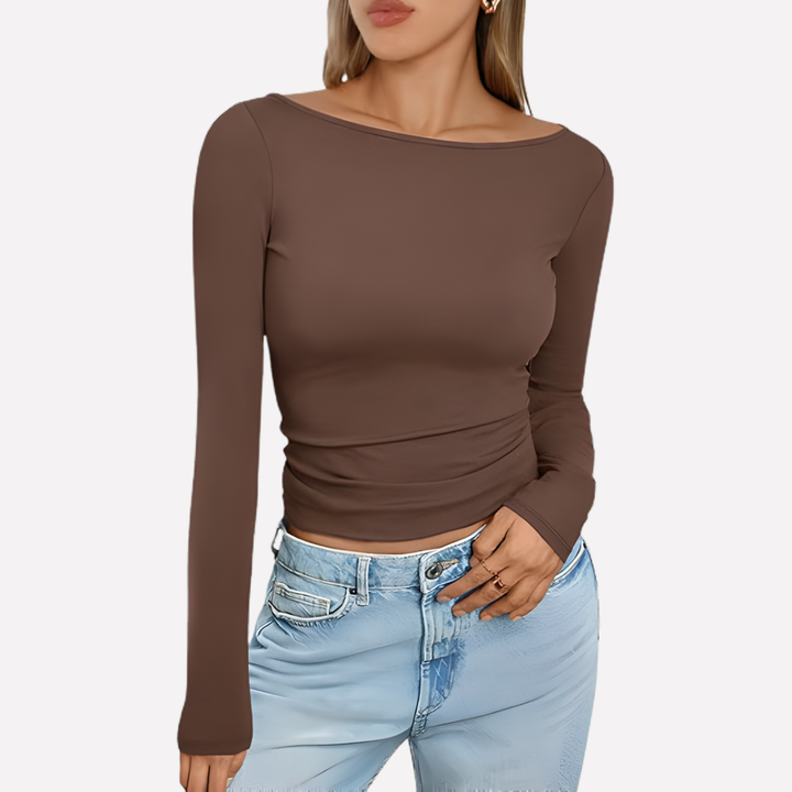 Casual dames top met lange mouwen en boothals; zachte stof, perfect voor een comfortabele look.