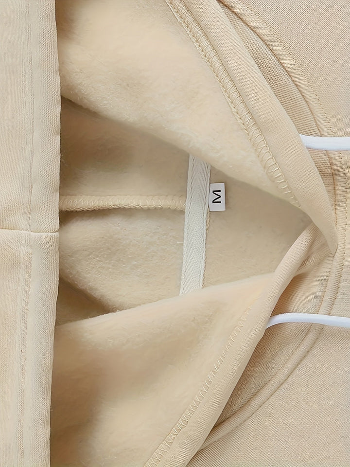 Beige heren hoodie, losse pasvorm, met capuchon en praktische kangoeroezak. Veelzijdige casual streetwear.