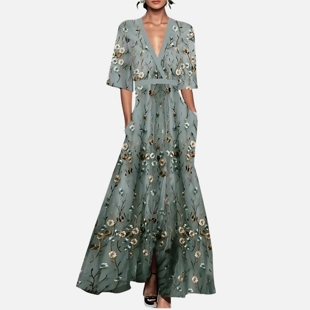 Elegante dames maxi-jurk met vrolijke bloemenprint, perfect voor zomerse dagen of een casual strandlook.