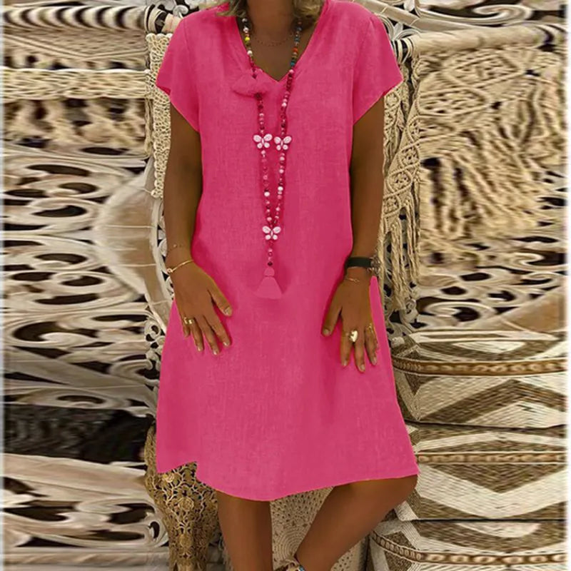 Losvallende dames midi-jurk met stijlvolle V-hals en kapmouwen. Ideale comfortabele casual zomerjurk.