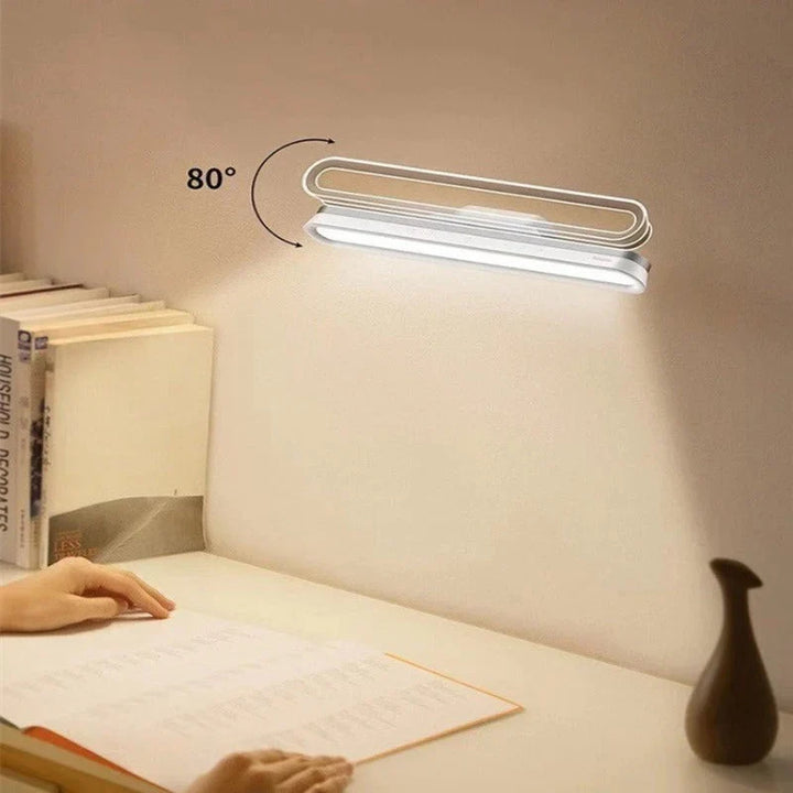 Compacte FlexiGlow LED lamp, draadloos oplaadbaar, met aanraaksensor voor flexibele lichtstanden.