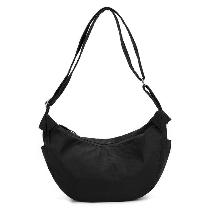 Groene halve maan tas dames, trendy en veelzijdig, met verstelbare riem als modieus accessoire.