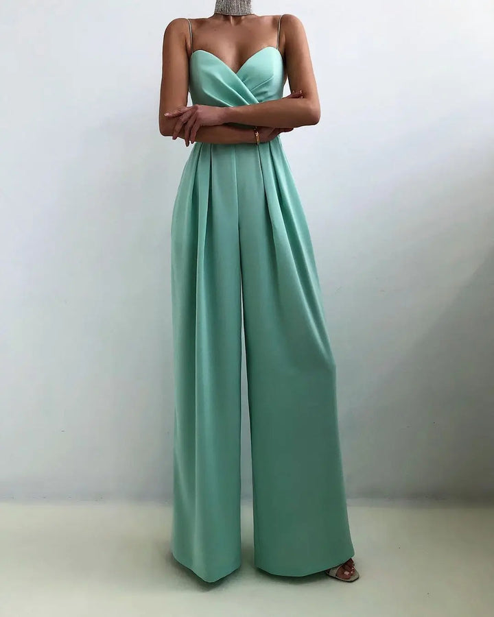 Zomerse dames jumpsuit: mouwloos, v-hals en wijde pijpen. Comfortabel en stijlvol voor warme dagen.