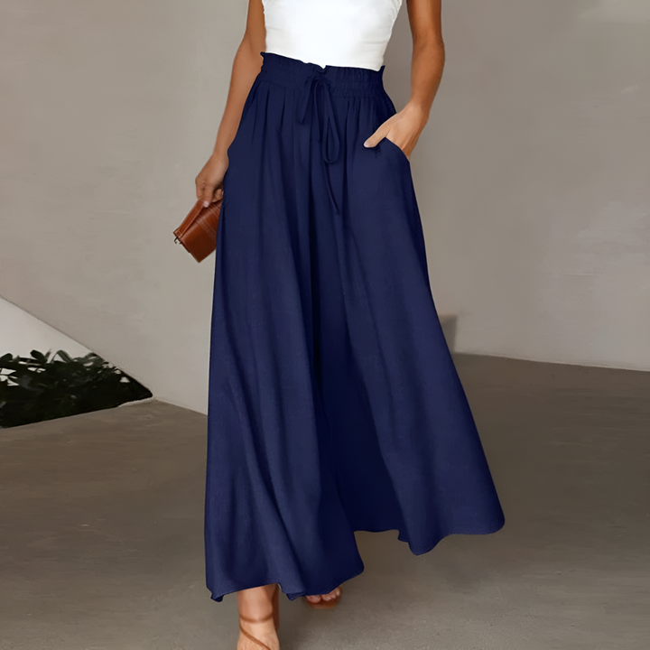 Ademende polyester dames rokbroek met elastische taille, wijde pijpen en een casual zomerlook.