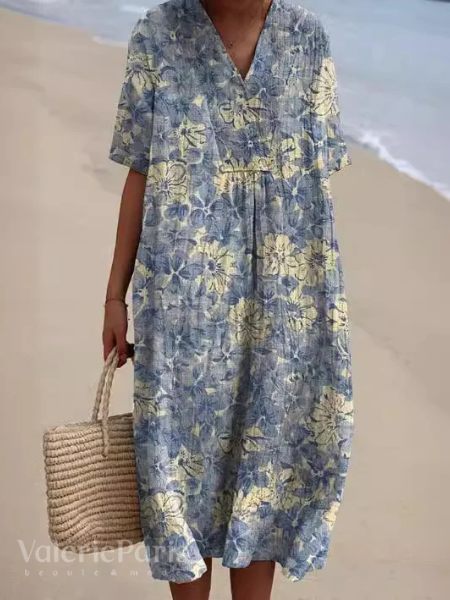 Dames zomerjurk met levendige bloemenprint, comfortabel en flatterend voor lente en zomer.