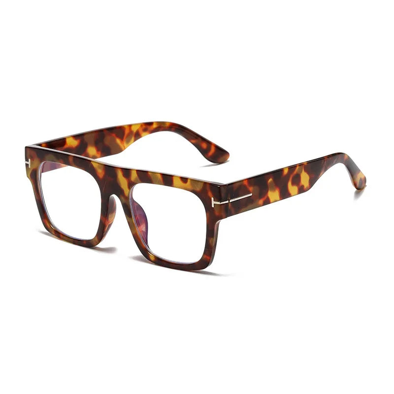 Heren zonnebril, oversized en trendy, met helder blauwe glazen. Een essentieel vintage mode accessoire.
