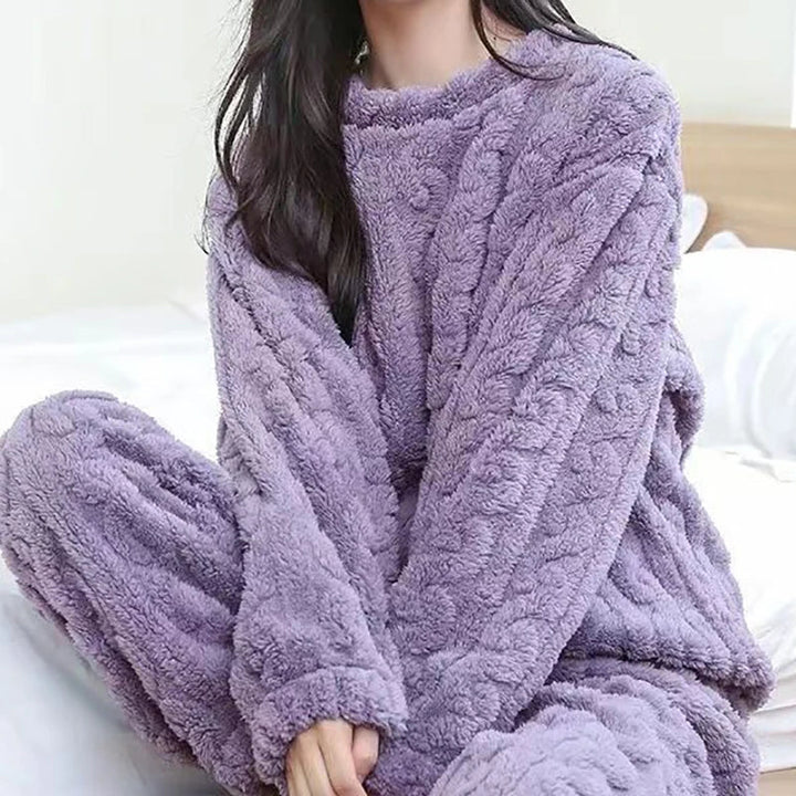Stijlvolle dames geribbelde set, bestaande uit top en broek, voor ultiem comfort en ontspanning.