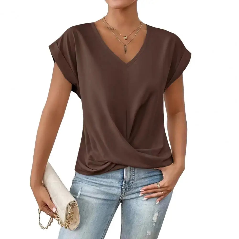 Elegante V-hals top voor dames met trendy geplooide accenten, veelzijdig te combineren.