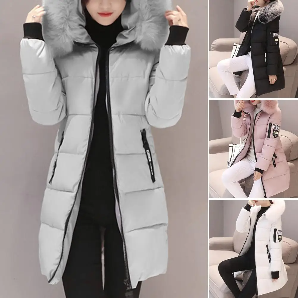 Dames winterjas Elinora met ruime capuchon, warm en windbestendig. Comfortabele halflange buitenkleding.