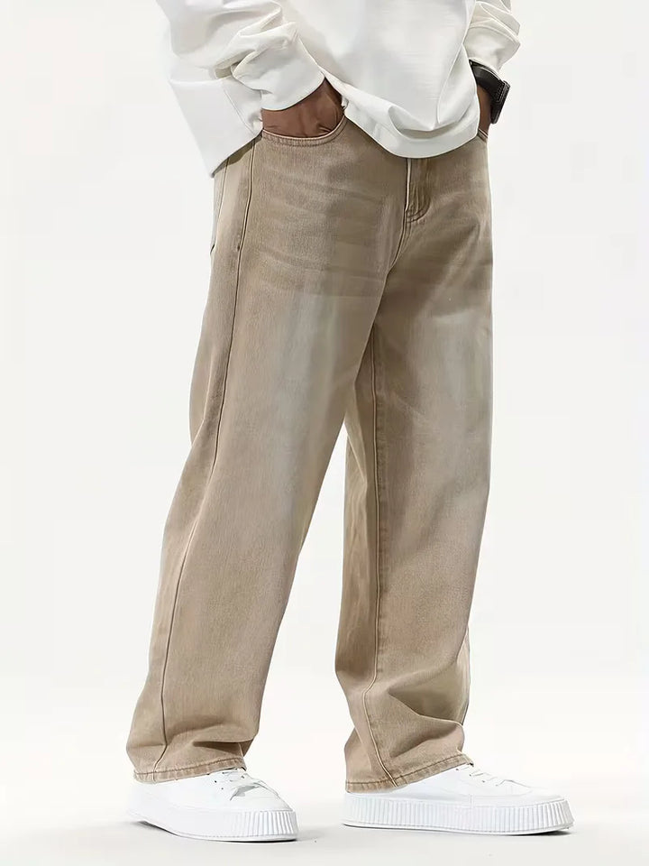 Stijlvolle heren wide leg jeans in kaki, met een loose fit en mid-rise, perfect voor casual lente/zomer mode.