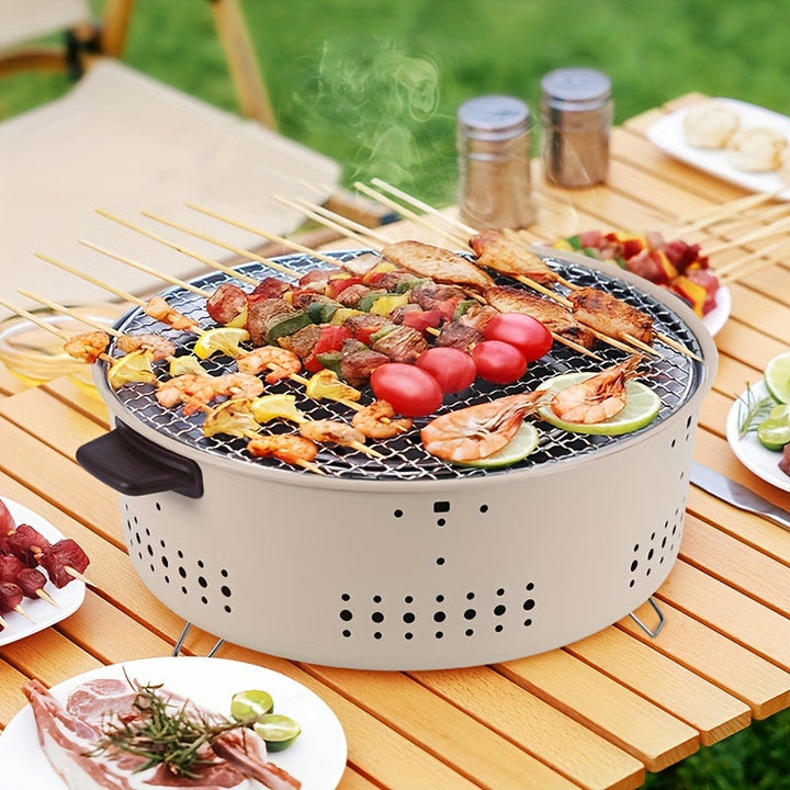 Nieuwe roestvrijstalen compacte houtskoolbarbecue, perfect voor avonturen, camping, picknick en tuin.