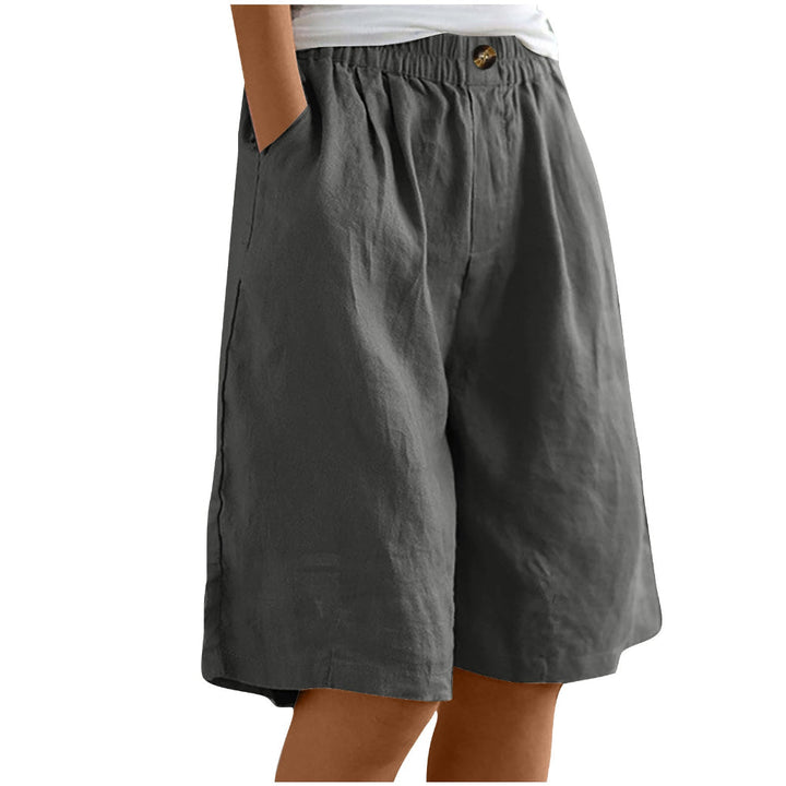 Strandmode damesshort, hoge taille, losse pasvorm. Comfortabel katoen linnen, perfect voor de zomer.