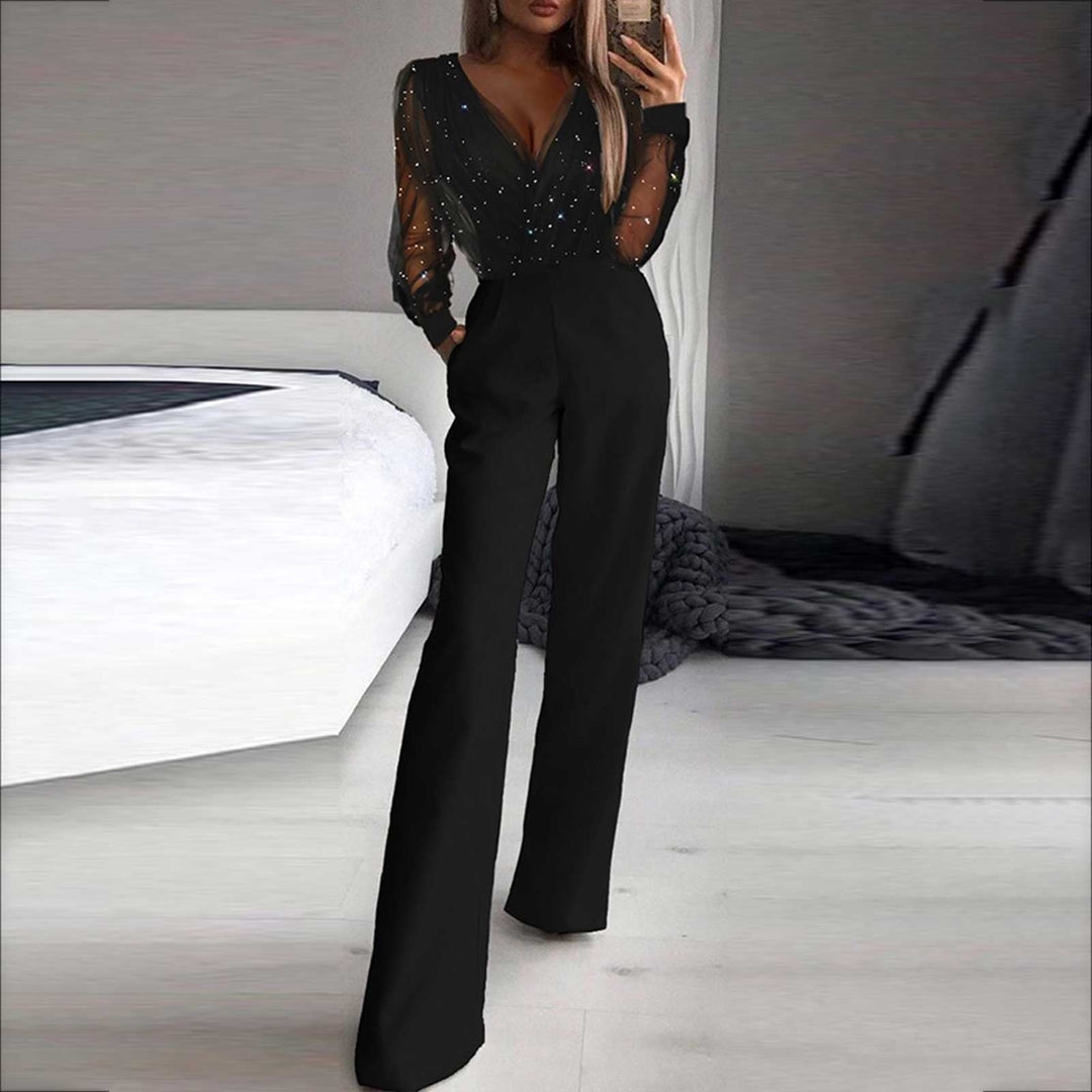 Stijlvolle zwarte jumpsuit voor dames, veelzijdig en elegant voor elke gelegenheid. Hoymans mode.