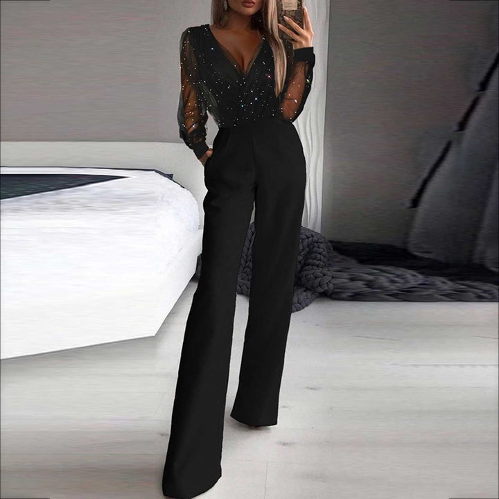 Stijlvolle zwarte jumpsuit voor dames, veelzijdig en elegant voor elke gelegenheid. Hoymans mode.
