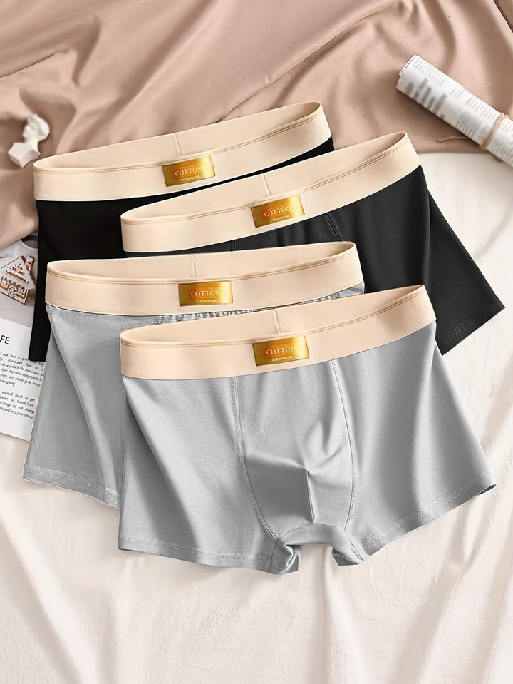 Stijlvolle effen heren boxershorts (4-pack) met stretch. Comfortabel basis ondergoed met slanke pasvorm voor herenkleding.