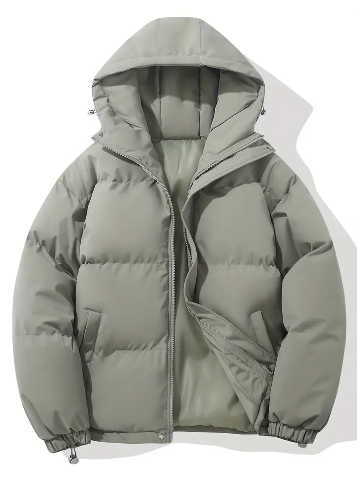 Functionele ritsen en diepe zakken van de stijlvolle casual heren winterjas, comfortabele details voor dagelijks gebruik.