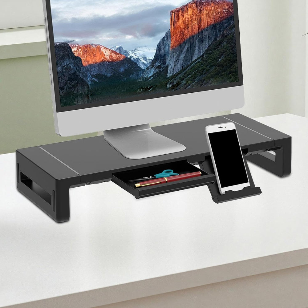 In hoogte verstelbare monitorstandaard met opberglade en USB poorten, ideaal voor kantoor.