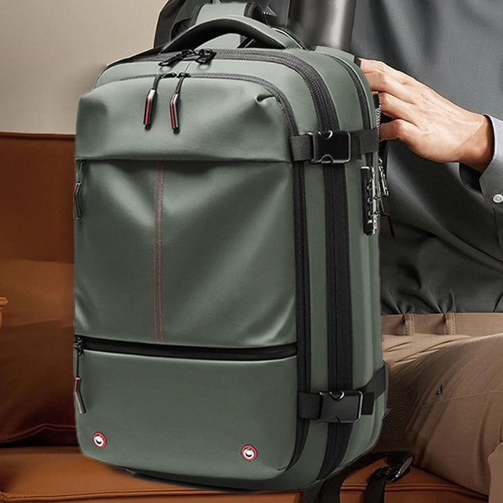 Uitbreidbare 60 liter reisrugzak unisex, waterdicht, met laptopcompartiment en vacuümcompressie.