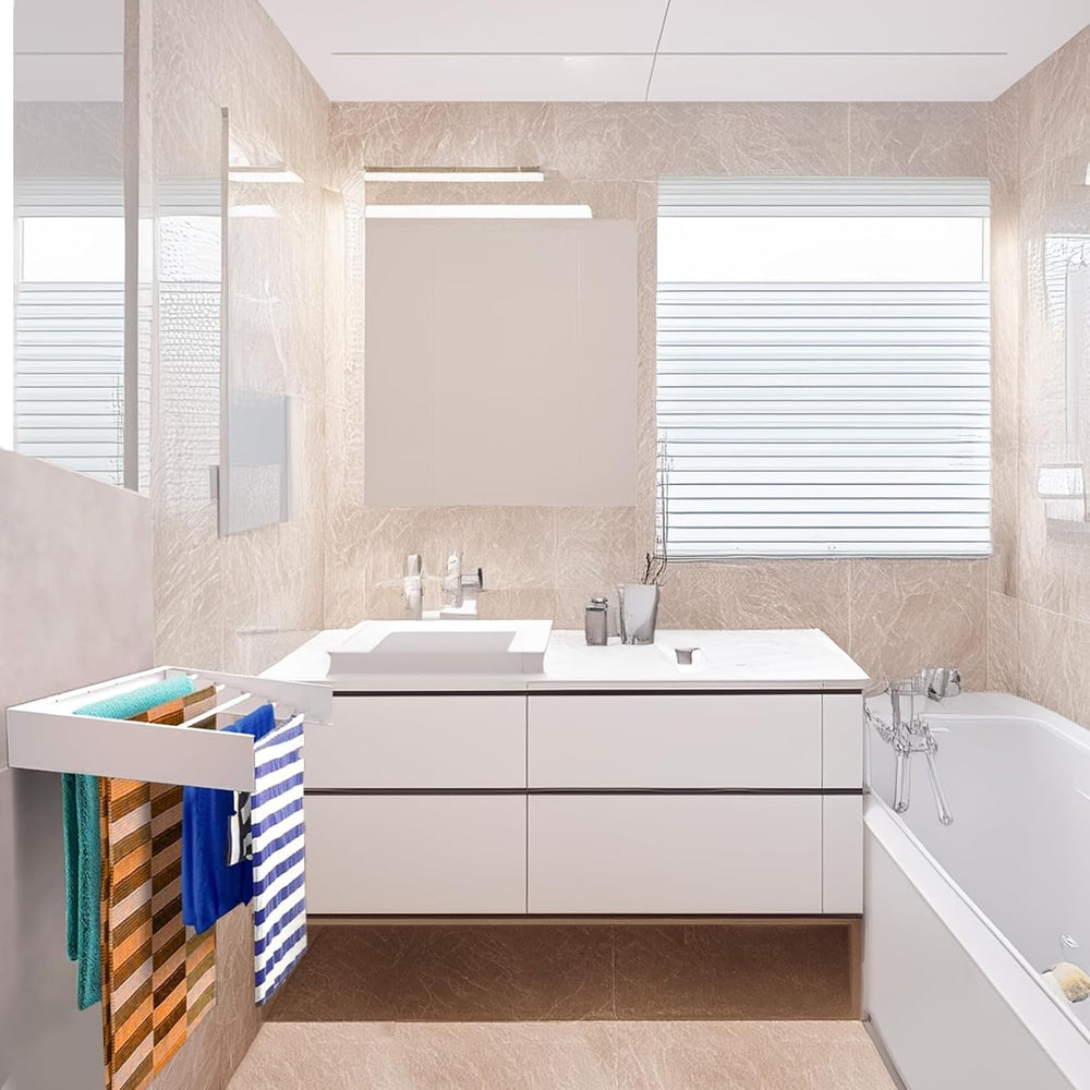 Compact vouwbaar wanddroogrek in wit, ideaal voor kleine ruimtes; eenvoudig op te hangen.