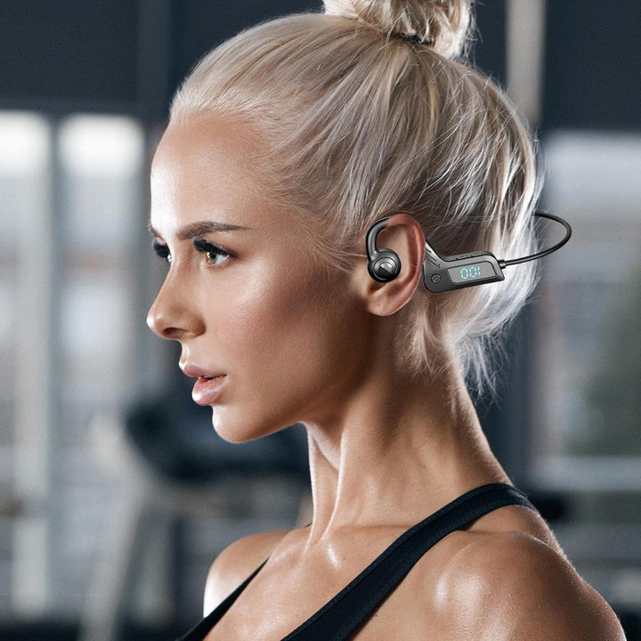 Sportieve draadloze botgeleiding hoofdtelefoon voor workouts; veilig muziek luisteren met open oren.