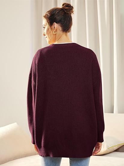 Oversized damesvest met V-hals, knoopsluiting, combineert warmte en mode in één trui.