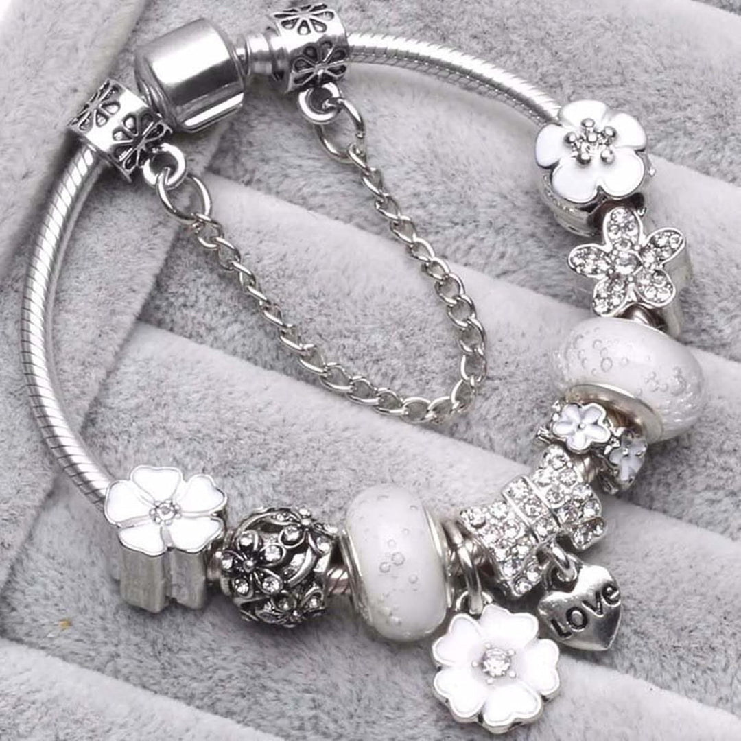 925 sterling zilveren damesarmband met romantische bloemen charms, ideaal voor persoonlijke stijl.