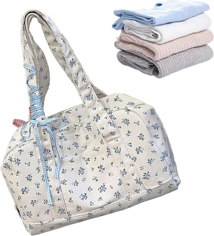 Stijlvolle blauwe canvas weekendtas dames, ruime duffle bag met lint detail, ideaal voor trips.