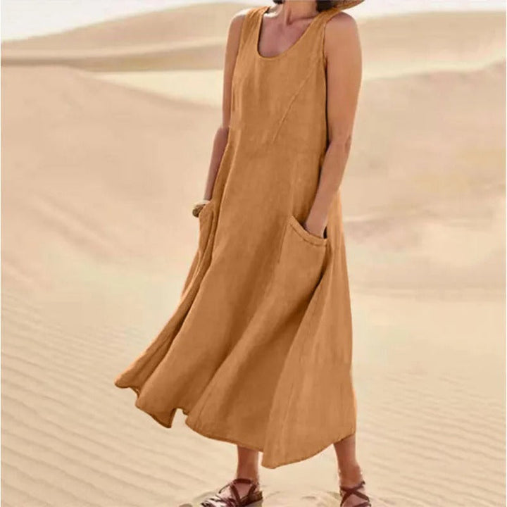 Zomerse mouwloze linnen dames midi jurk, comfortabel en luchtig, perfect voor warme temperaturen.