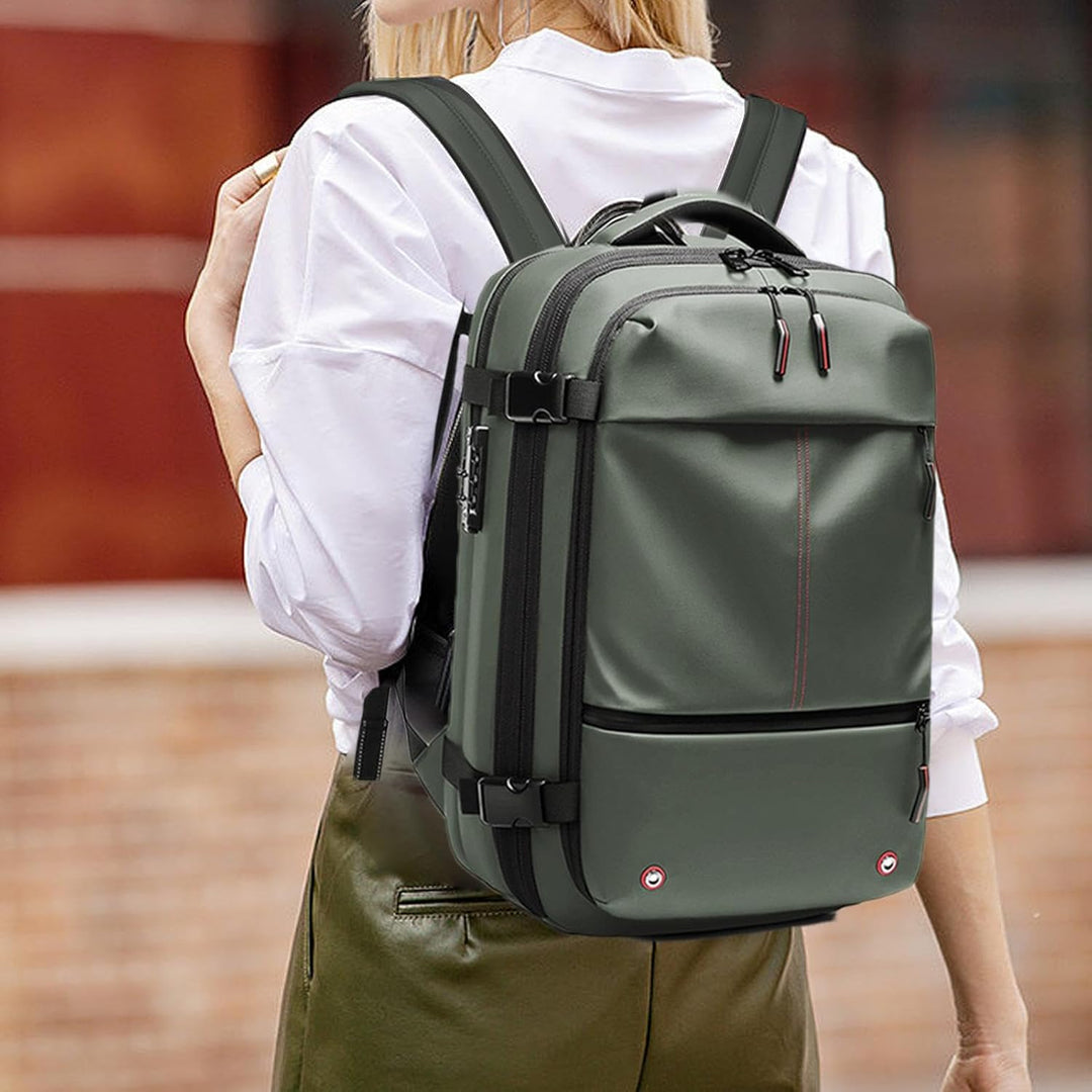 Legergroene waterdichte reisrugzak 60L, uitbreidbaar, vacuümfunctie, perfect voor laptop & bagage.