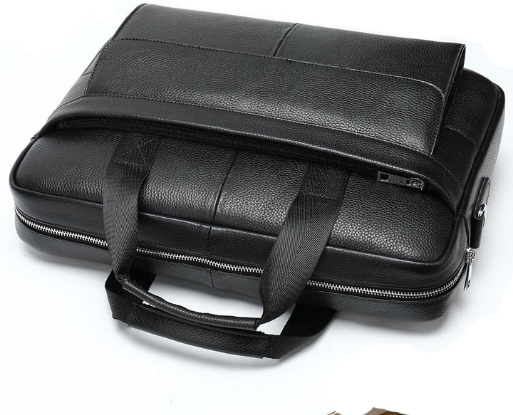 Duurzame leren aktetas voor 15 inch laptops. Inclusief organiser vakken voor al je zakelijke benodigdheden.
