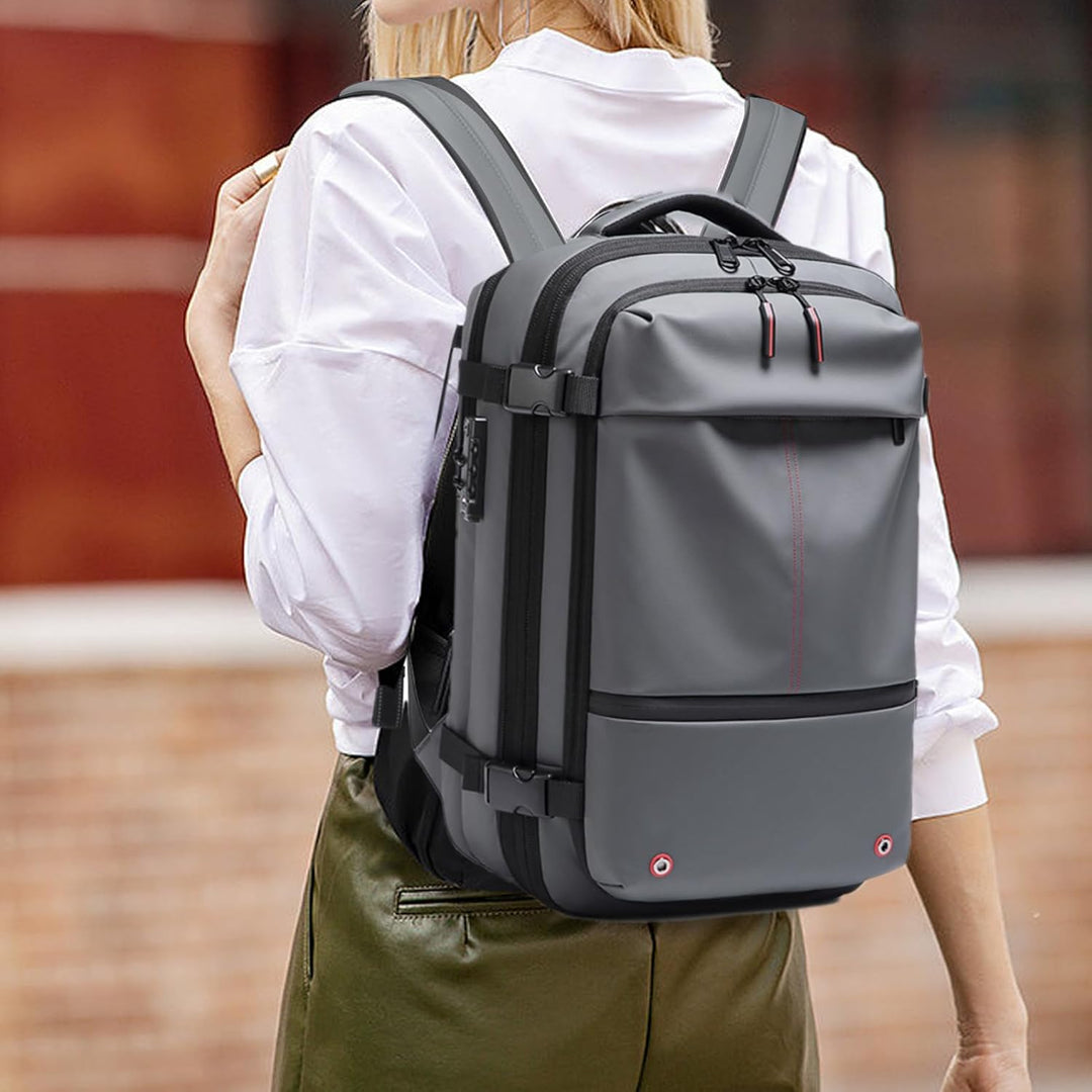 Slimme reisrugzak 60L, waterdicht, uitbreidbaar, met geïntegreerd laptopvak en vacuümcompressie.
